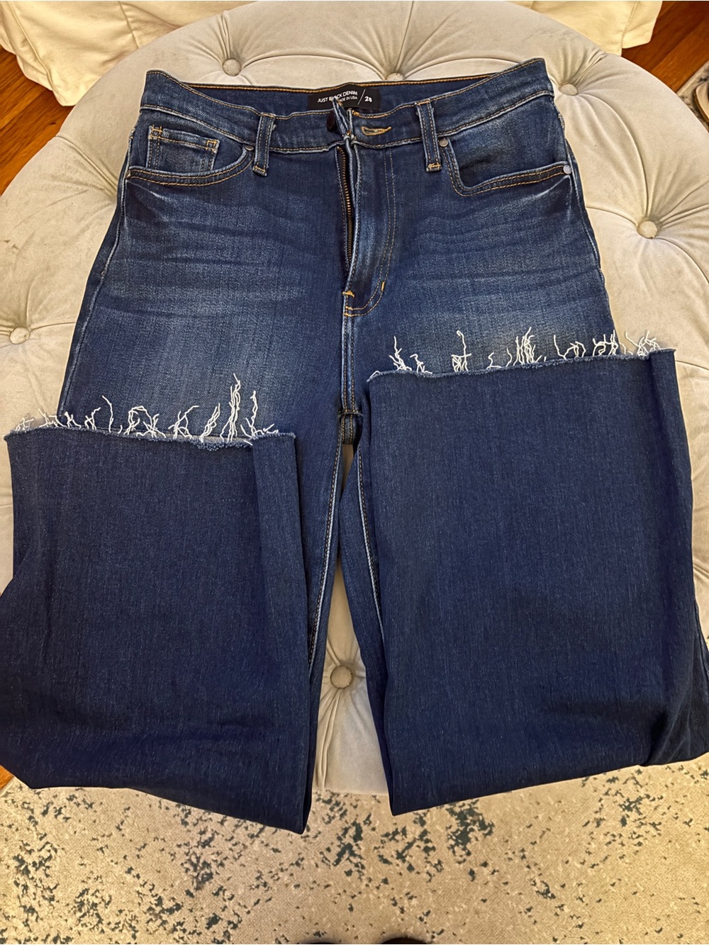 Scissor cut hemmed wide leg jeans